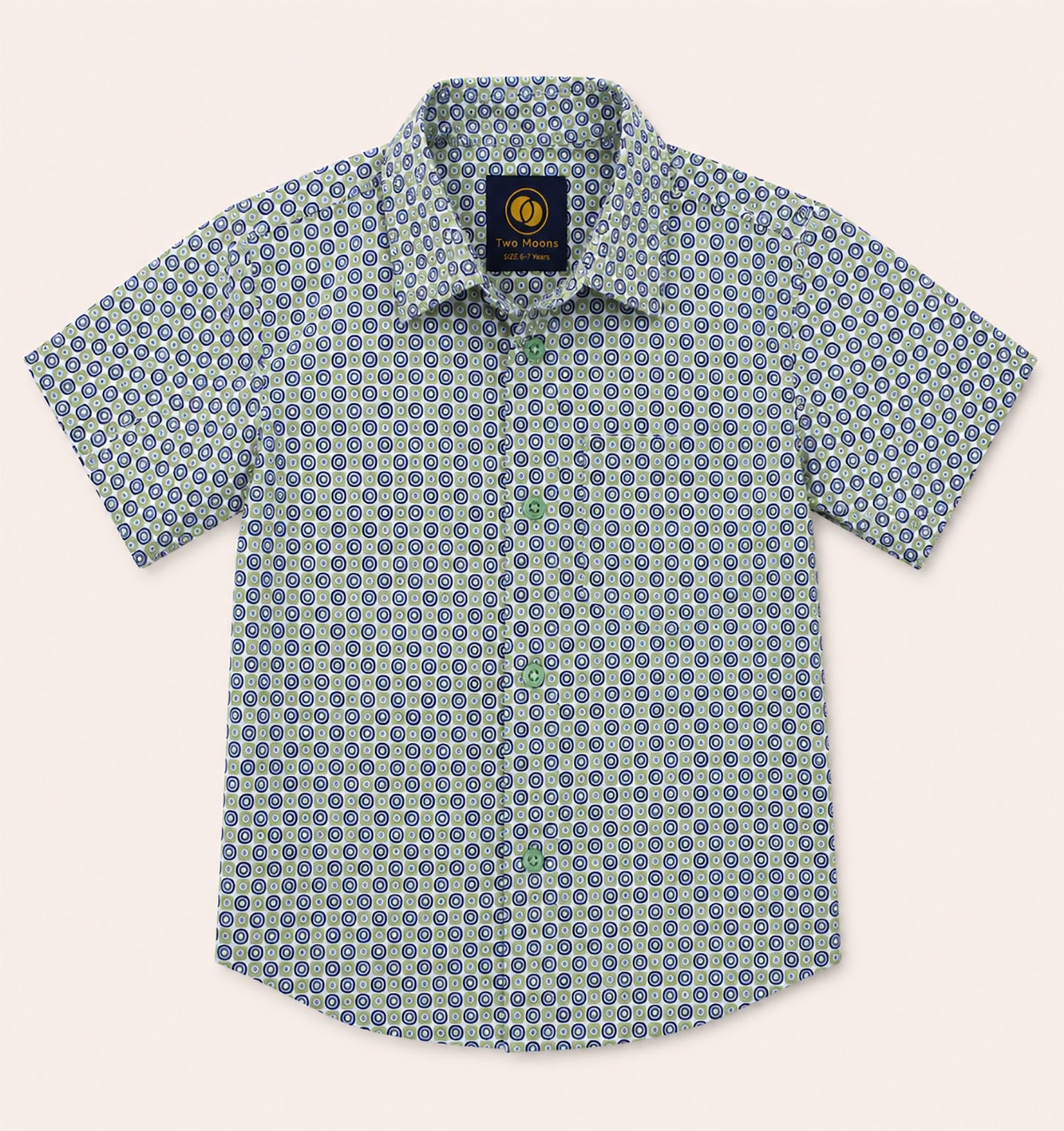 Front view of a kids short-sleeve button-down shirt featuring a green and navy blue geometric circle pattern with light green buttons.