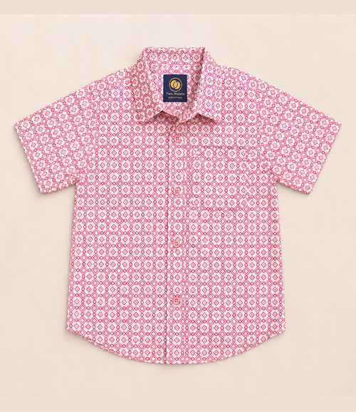 Front view of a pink and white kids short-sleeve button-down shirt featuring a geometric diamond pattern.