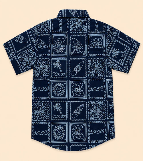 Back view of a navy blue kids short-sleeve button-down shirt displaying the repeating white line-art coastal surf pattern.