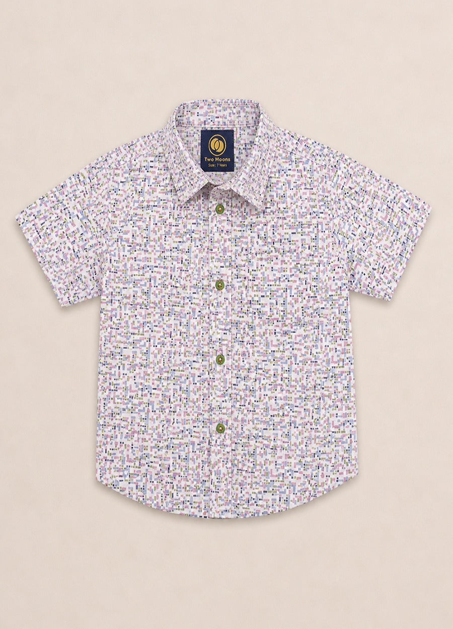 Two Moons Canada kids short-sleeve button-down shirt front side featuring a pastel geometric mosaic print with contrasting green buttons.
