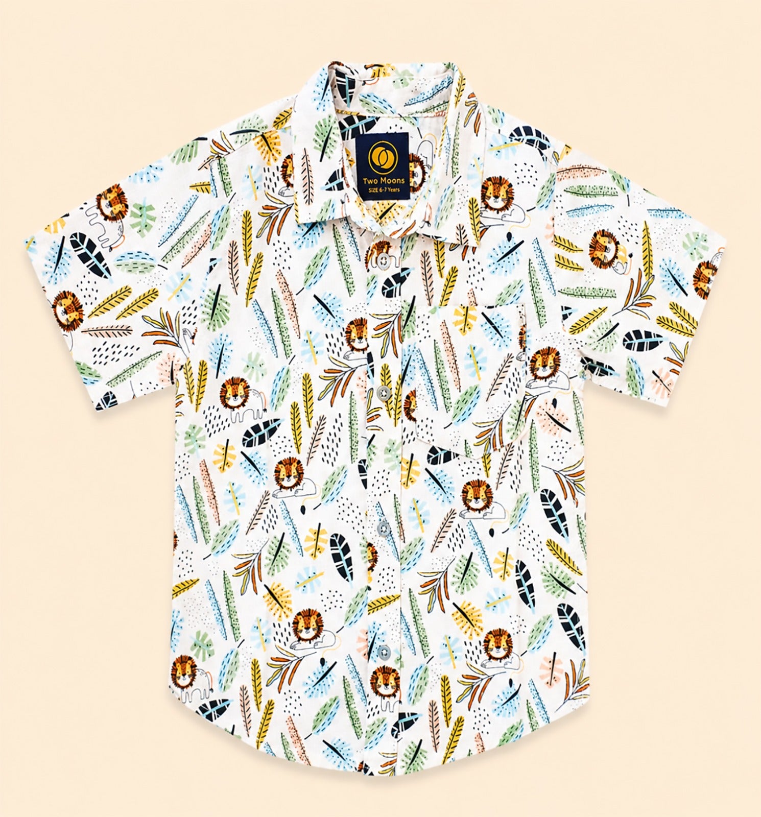Front view of a white kids short-sleeve button-down shirt featuring a colorful safari lion and jungle botanical leaf pattern.