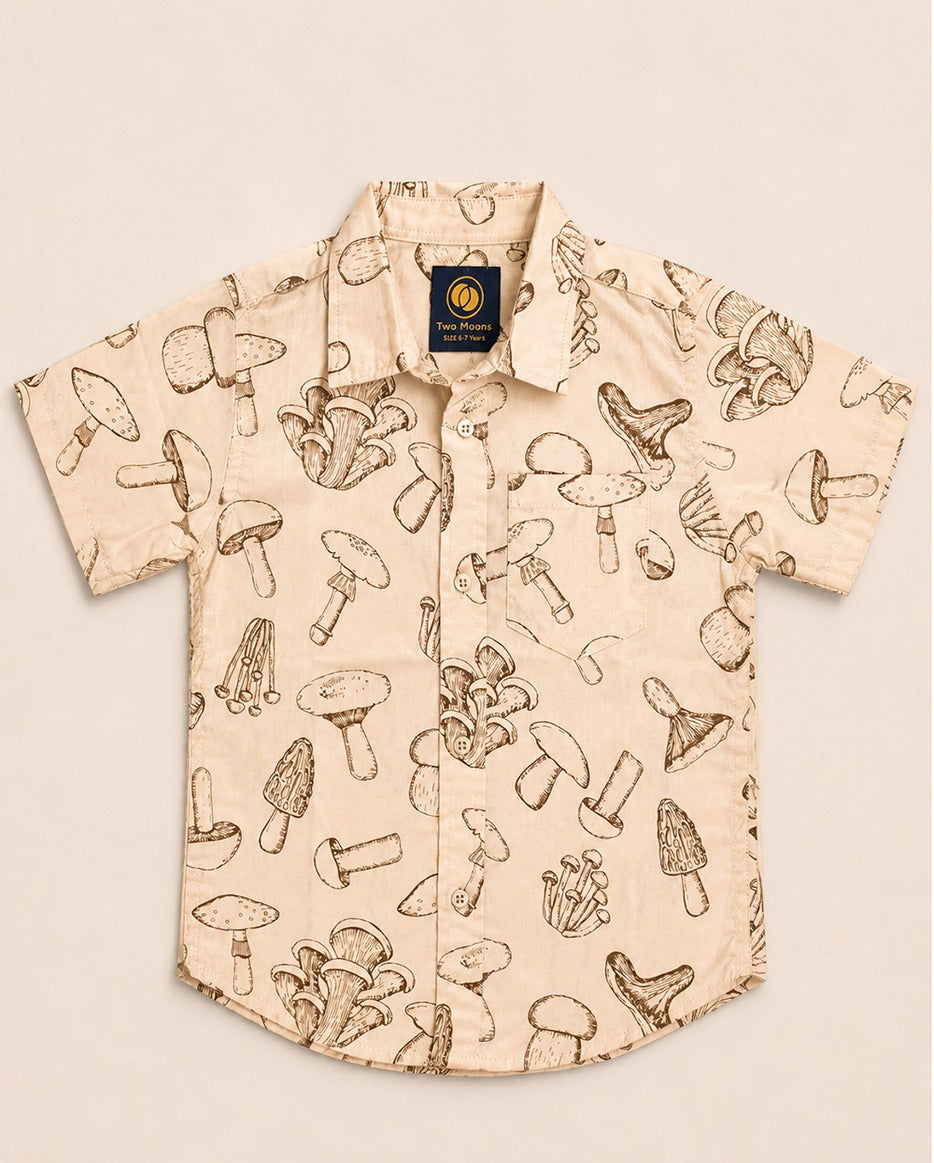 Two Moons Canada kids short-sleeve button-down shirt front side featuring a brown vintage botanical mushroom print on a beige background