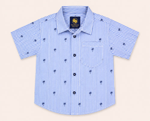 Front view of a light blue and white striped kids short-sleeve button-down shirt featuring small navy blue palm trees.