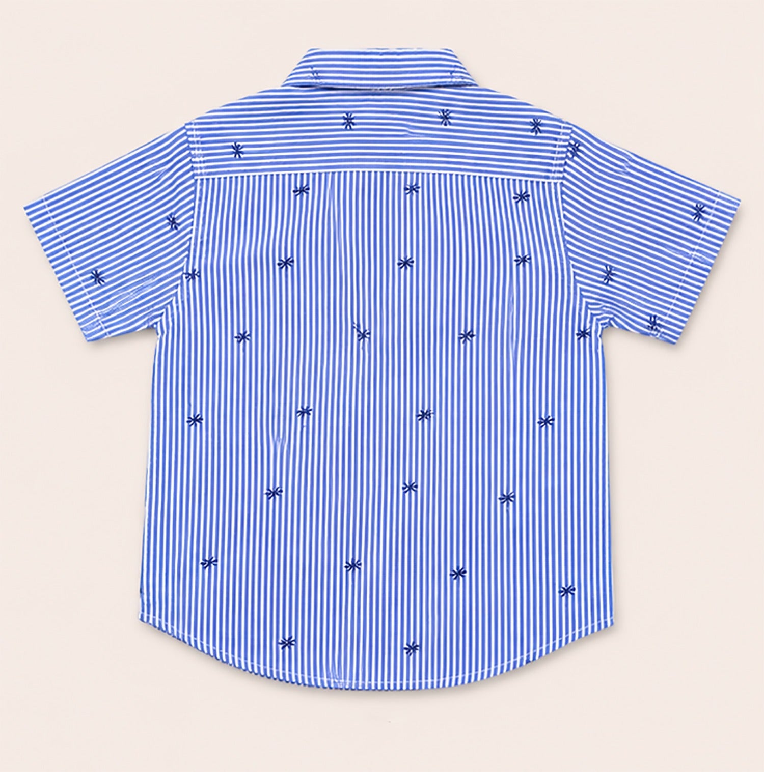 Back view of a light blue and white striped kids short-sleeve button-down shirt showing the repeating small navy palm tree pattern.