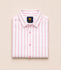 Neatly folded kids button-down shirt highlighting the crisp pink and white vertical stripes and coordinating pink buttons.