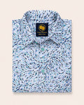 Neatly folded kids button-down shirt highlighting the swirling blue abstract wave print and contrasting light teal buttons.